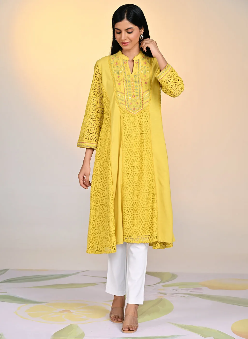 Fariha Carnation Yellow Embroidered Raschel
Net Dress for Women